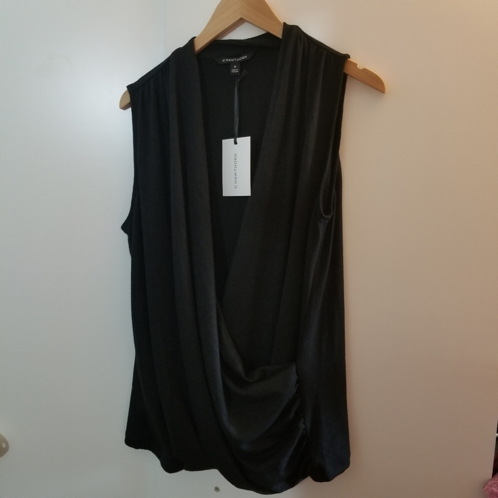 Faux wrap sleeveless knit blouse